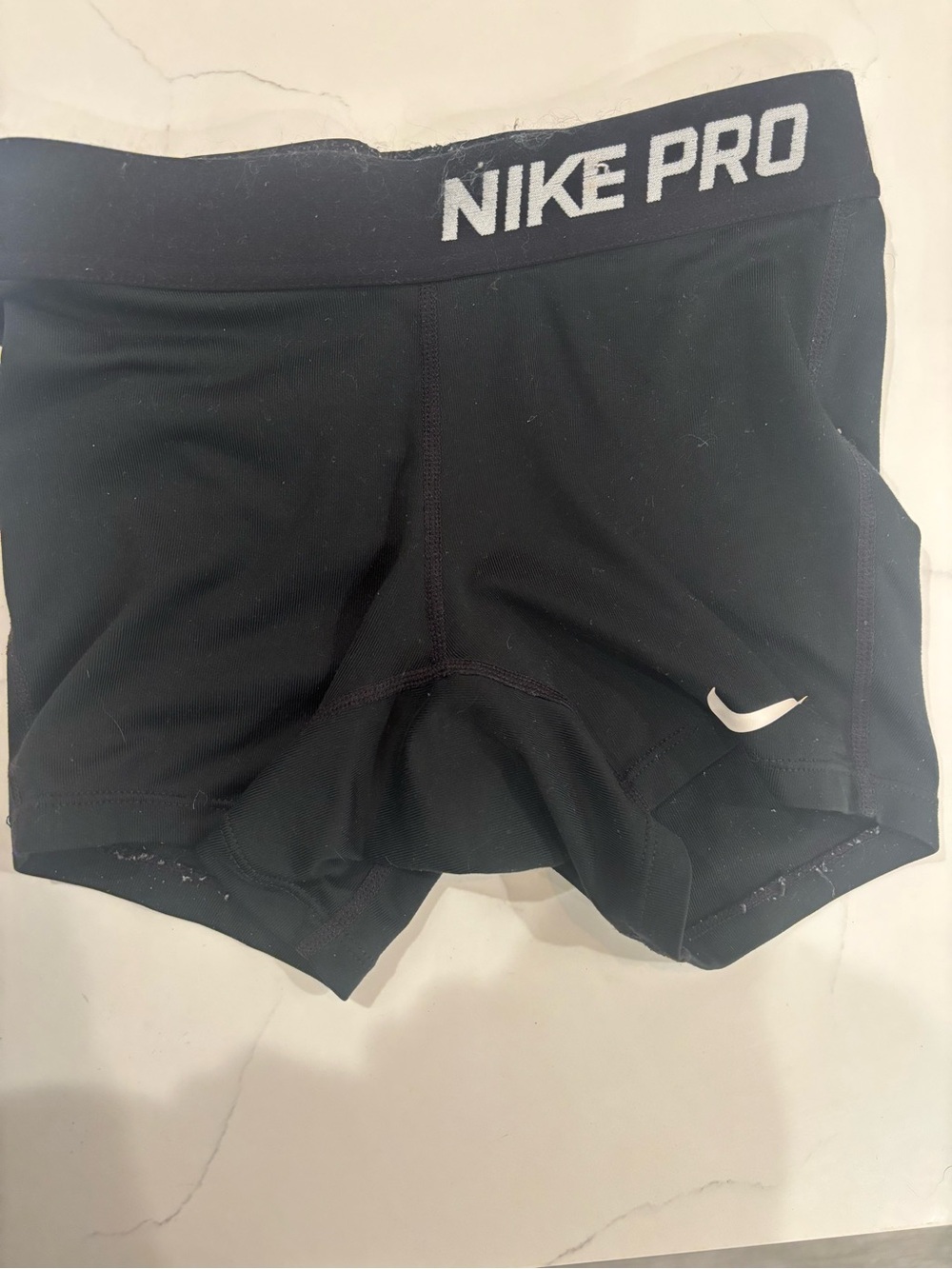 Nike Black Youth Compression Shorts with White Swoosh